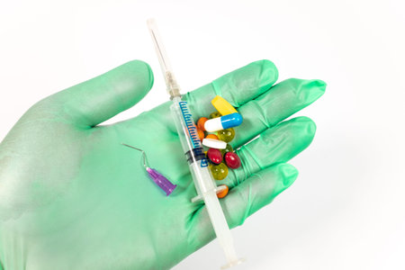 medicine. treatment. covid 19. hospital. hands of a doctor. pills and injections. thermometers and...