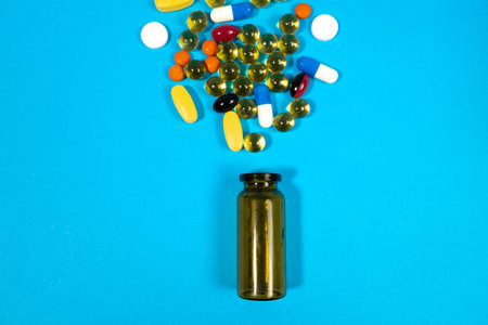 medicine. treatment. covid 19. hospital. hands of a doctor. pills and injections. thermometers and syringes. injections. therapy. human health.の写真素材