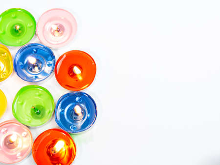 beautiful colored candles. candle fire. decorative colored candles. holidays. romantic mood.の写真素材