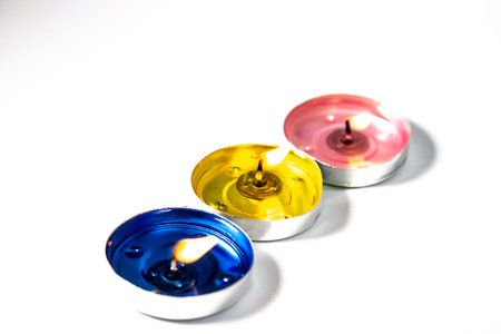 beautiful colored candles. candle fire. decorative colored candles. holidays. romantic mood.の写真素材