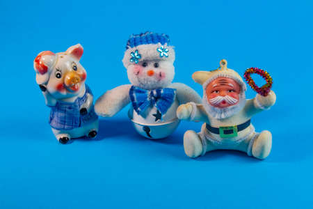 New Year's Holidays. Festive mood. Christmas and New Year. Decoration for the Christmas tree. Toys and gifts. Christmas tree. holiday and fun. winter vacation. winter holidays. christmas background. New Year characters. Snowman, santa claus. Father Frost.の写真素材