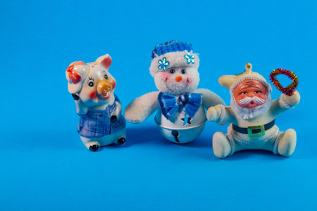 New Year's Holidays. Festive mood. Christmas and New Year. Decoration for the Christmas tree. Toys and gifts. Christmas tree. holiday and fun. winter vacation. winter holidays. christmas background. New Year characters. Snowman, santa claus. Father Frost.の写真素材