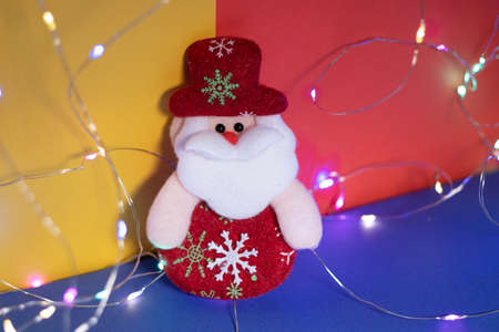 New Year's Holidays. Festive mood. Christmas and New Year. Decoration for the Christmas tree. Toys and gifts. Christmas tree. holiday and fun. winter vacation. winter holidays. christmas background. New Year characters. Snowman, santa claus. Father Frost.の写真素材