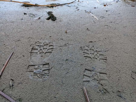 footprints in the sand. footprints in the sand. prints on the shore. shoe mark. footprints in the sand. shoe printの写真素材