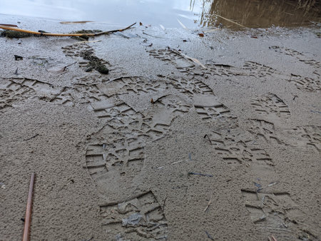 footprints in the sand. footprints in the sand. prints on the shore. shoe mark. footprints in the...