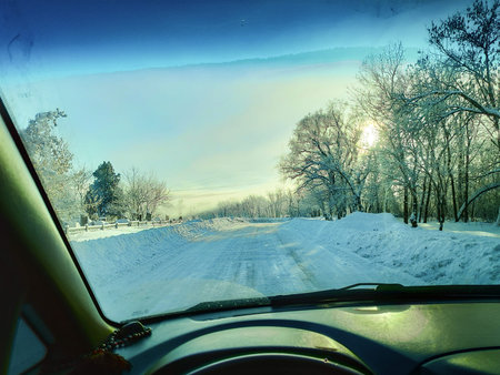 inside the car. driver behind the wheel. drive a car. journey. bad roads. by car. steering wheel and...
