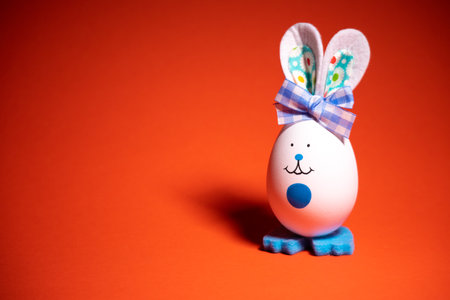Easter eggs. funny hares. toy rabbit. toy egg. statuette easter bunny.の写真素材