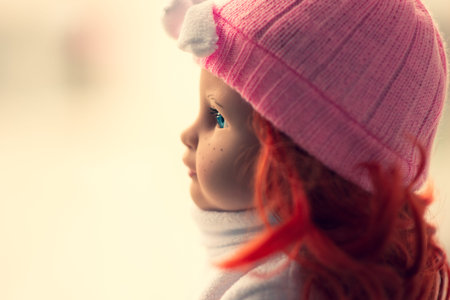 beautiful vintage doll. doll woman. beautiful doll face. female figure. beautiful eyes. ceramic old dolly. Toy girl. Beautiful large plastic doll weared in national dress.の写真素材