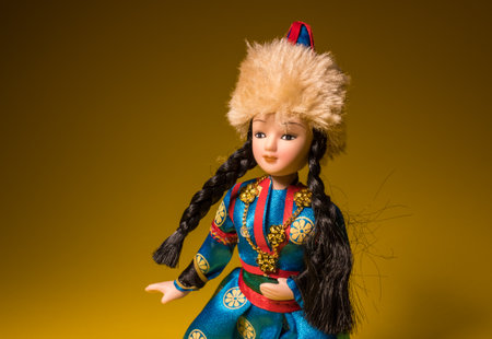 beautiful vintage doll. doll woman. beautiful doll face. female figure. beautiful eyes. ceramic old dolly. Toy girl. Beautiful large plastic doll weared in national dress.の写真素材