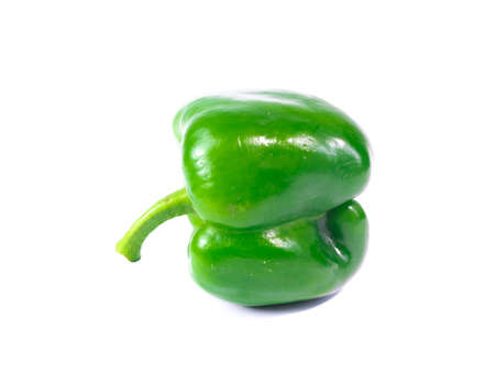 Bell pepper. colorful vegetables and peas, yellow, green and red bell pepper. growing bell pepper in a farmer's fieldの写真素材
