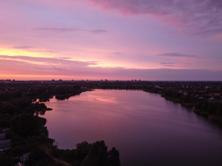 natural landscape with water. sunset and sunrise on the water. beautiful river. lake shore. reflection in the water. water flow. recreation on the shore of the reservoir.の写真素材