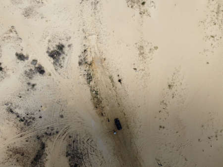 desert. white sand. road in the desert. dunes. grains of sand. white quartz sand.の写真素材