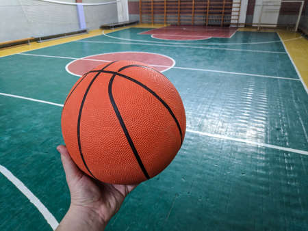 basketball. ball sports. basketball field. basketball player. ball in hand. basketball field and hoopの写真素材