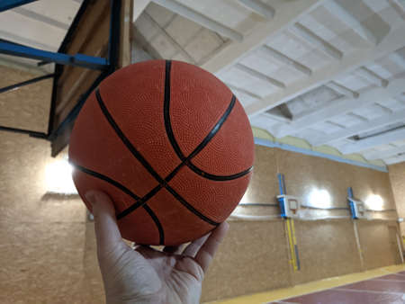 basketball. ball sports. basketball field. basketball player. ball in hand. basketball field and hoopの写真素材