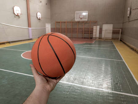 basketball. ball sports. basketball field. basketball player. ball in hand. basketball field and hoopの写真素材