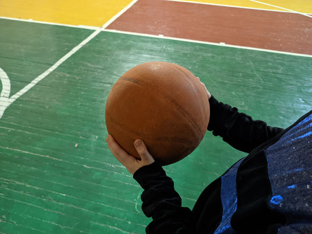basketball. ball sports. basketball field. basketball player. ball in hand. basketball field and hoopの写真素材