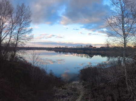 beautiful landscape with water. sky reflection in water. evening landscape on the river.