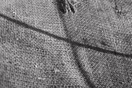 fabric texture close-up. sackcloth. fabric background. monochrome texture. woven threads. black and white.の写真素材