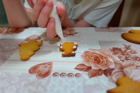 homemade cookies. Traditional Christmas gingerbread cookie. Remove hot biscuits from the oven. A...