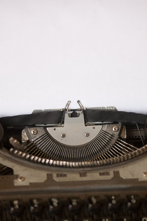 Typewriter with blank white paper