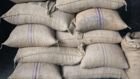 Hemp sacks containing coffee beanの写真素材