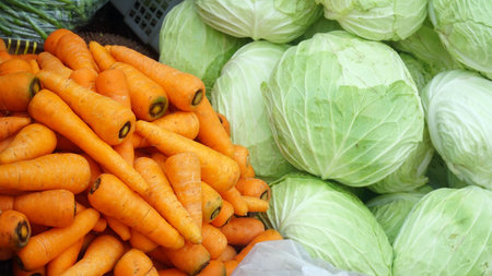 Fresh vegetable cabbage and carrots at the Marketの写真素材