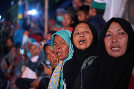 Temanggung, Indonesia. September 18, 2018. The typical face of Javanese Muslim women at a religious...