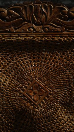 Back of a chair made of wood and rattan woven
