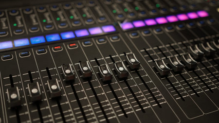 Black audio mixer. Focus selected on the slider button