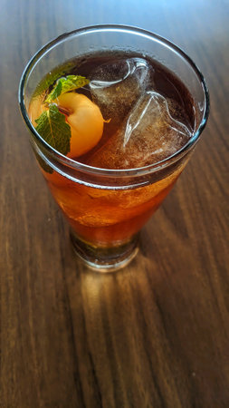 Iced tea with lychees and mint leaves in a glass. Top view. Focus selectedの写真素材