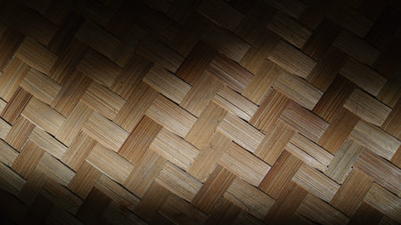 Neatly woven bamboo exposed to morning sunlight. Dark at the edge
