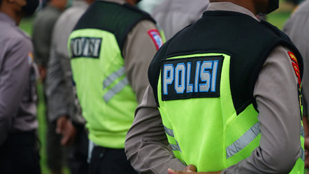 Mojokerto, Indonesia. August 18, 2024. A vest with the word POLISI or POLICE written on it, worn by...