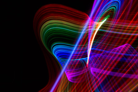 Bright glow light tracks against dark surrounding area.