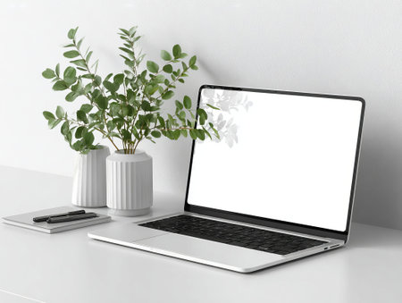 Laptop with blank screen on white table. 3d rendering.の素材