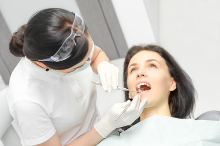 young girl checked on the dentist's chairの写真素材