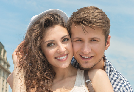 Portrait of a smiling young couple enjoying the day togetherの写真素材