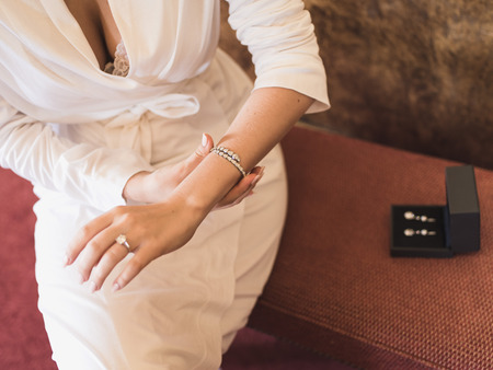 Woman in white robe and lace underwear. Wedding conceptの写真素材