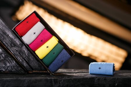 Set of casual socks of different colors in black gift box oneの写真素材