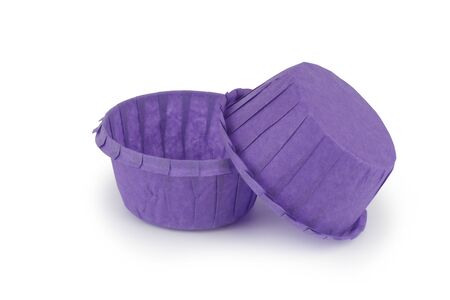 Muffin paper molds purple. Isolation on a white background, shadow below.の写真素材