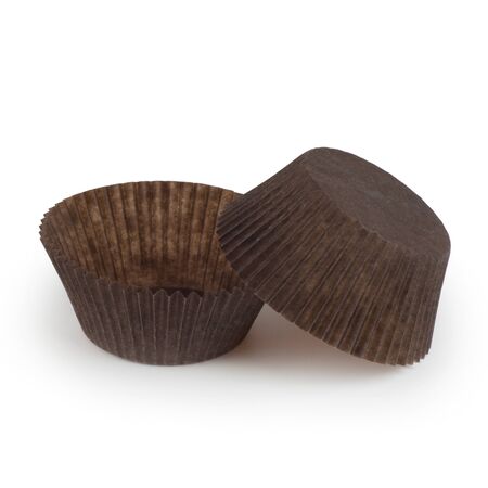 Brown muffin paper molds. Isolation on a white background, shadow below.の写真素材