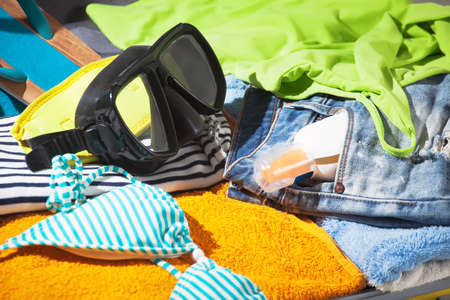 packing suitcase for vacationsの写真素材