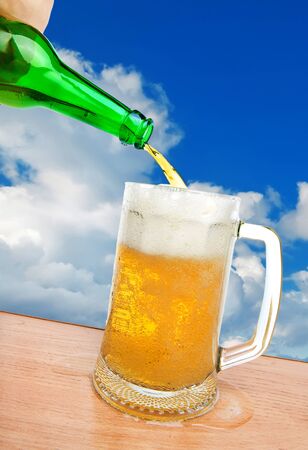 pouring beerの写真素材
