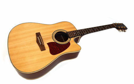 acoustic guitar isolated on whiteの写真素材
