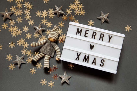 Christmas gray photophone with a sign with the inscription, snowflakes, stars and elfの写真素材