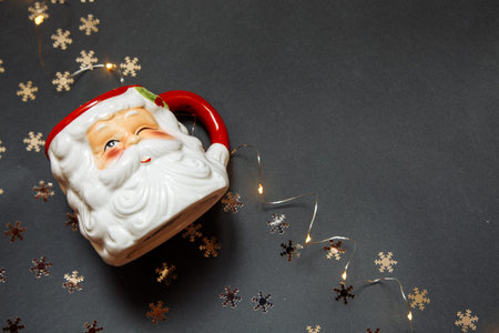 New Years gray photophone with a garland, Santa Claus and snowflakes