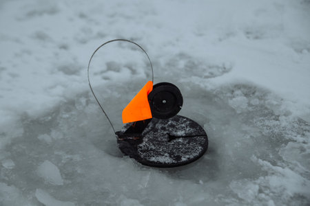 tackle with a red flag for winter fishingの写真素材