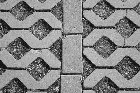 Urban industrial background of paving slabs with an interesting pattern