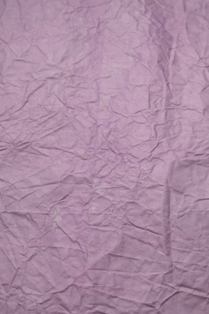 The texture and background of crumpled paper purpleの写真素材