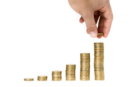 a mountain of money on a white background