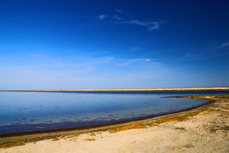 A serene lake in Arabat Spit, Crimea, Ukraine.の写真素材